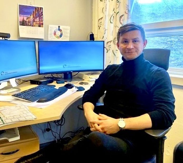 A person sitting at a desk