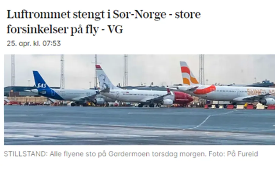 A group of airplanes on a runway