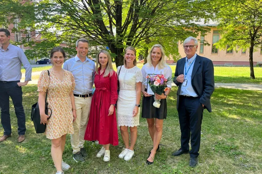 A group of people posing for a photo
