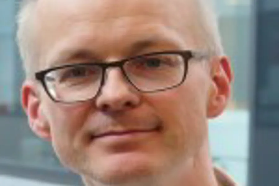 A man wearing glasses