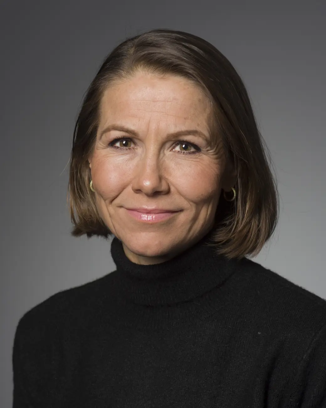 Kvinne som smiler