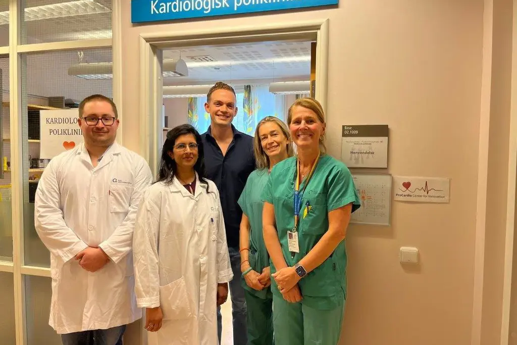A group of people posing for a photo