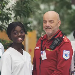 A man and woman smiling